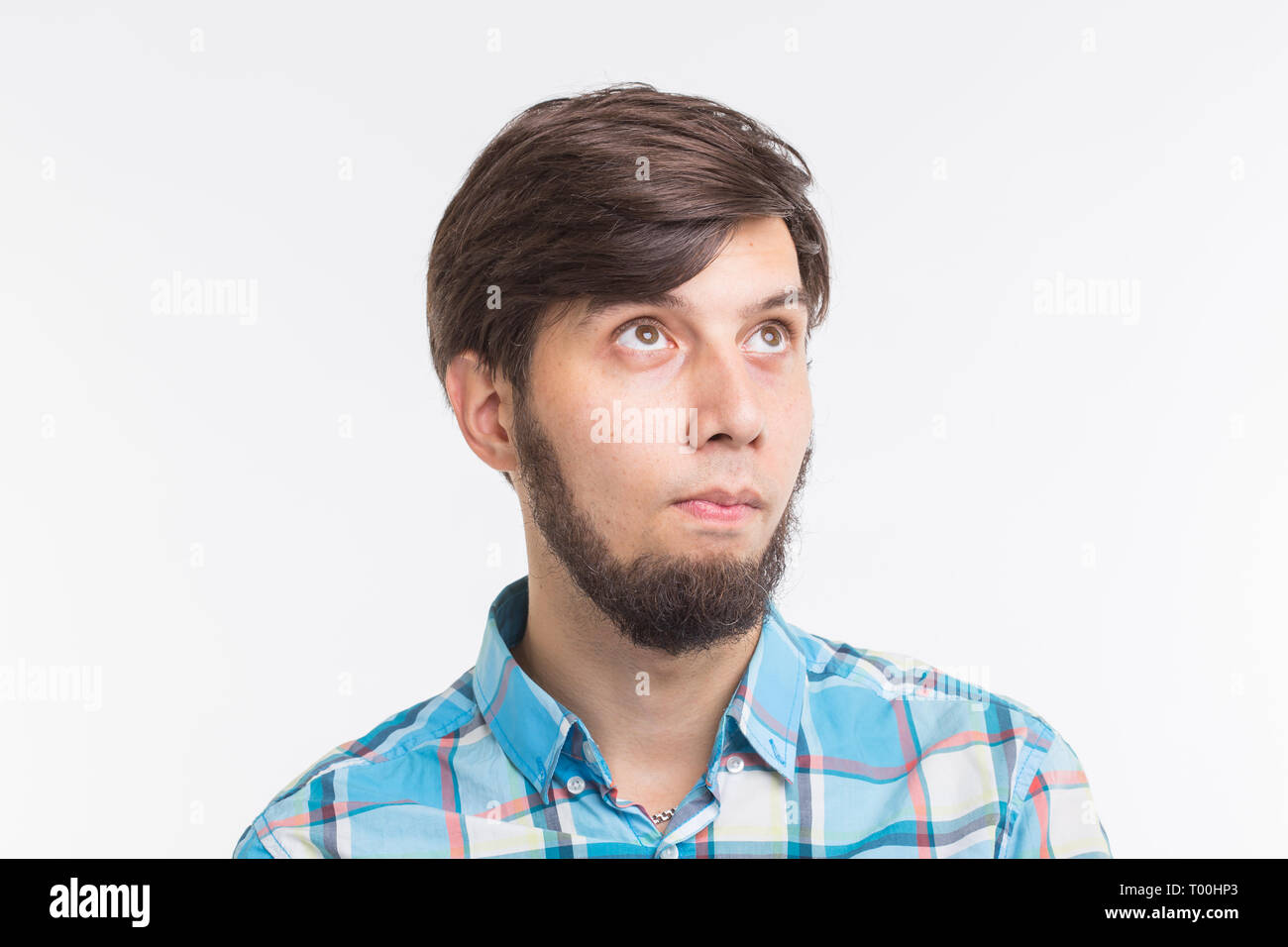 Process, problem, people concept - young man thinking about something ...