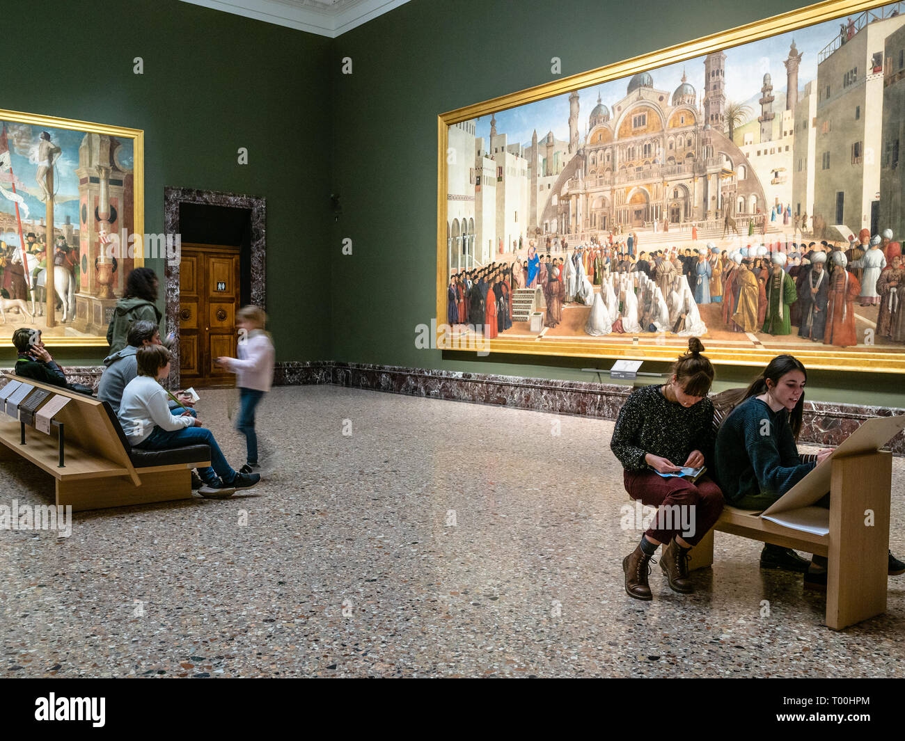 MILAN, ITALY - FEBRUARY 24, 2019: students in hall in Pinacoteca di Brera (Brera Art Gallery) in Milan. The Brera is national picture gallery of ancie Stock Photo