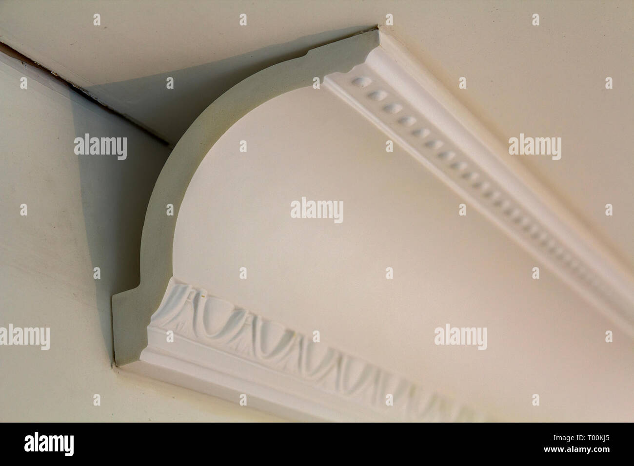 Close Up Detail Of Decoration White Molding Connected With Glue