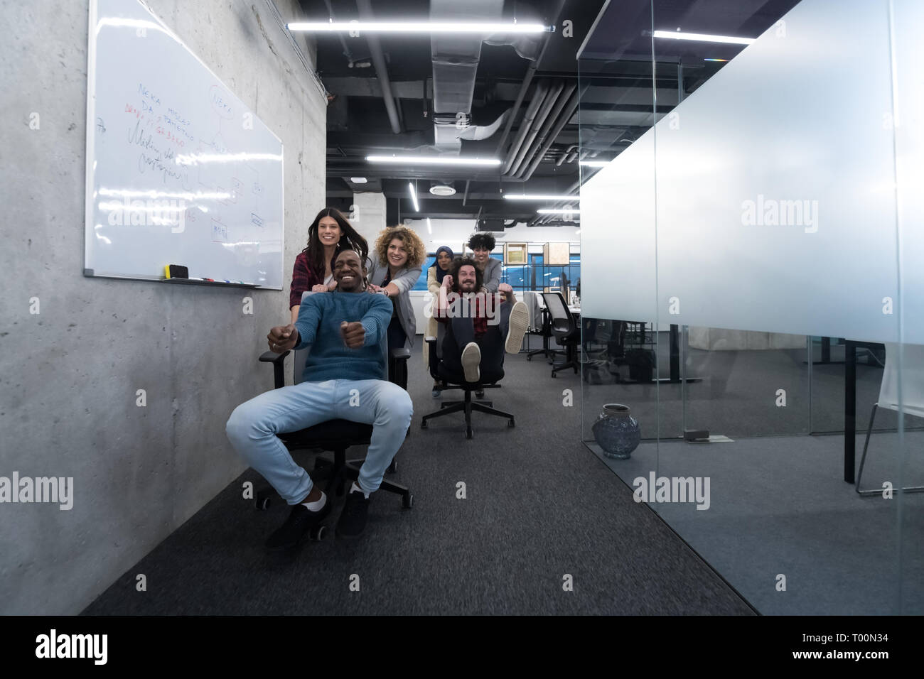 multiethnics startup business team of software developers having fun ...