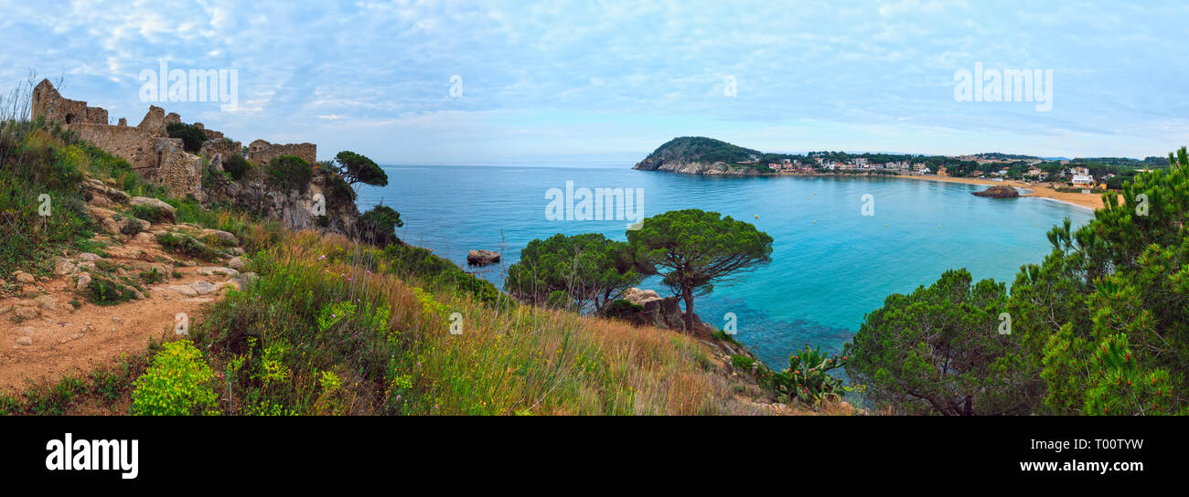 La Fosca beach summer early morning landscape with castle ruins (Sant Esteve de Mar), Palamos, Girona, Costa Brava, Spain. Stock Photo