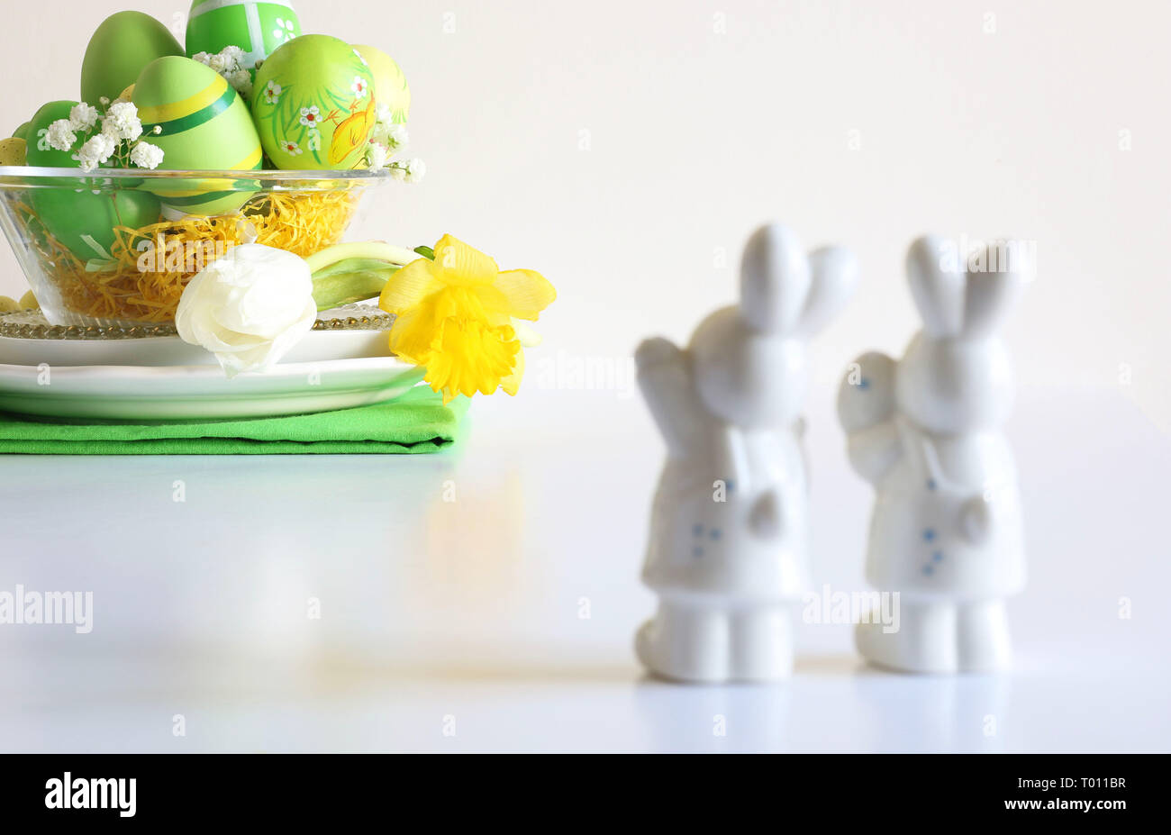 Two bunnies and easter decoration isolated on white background Stock Photo