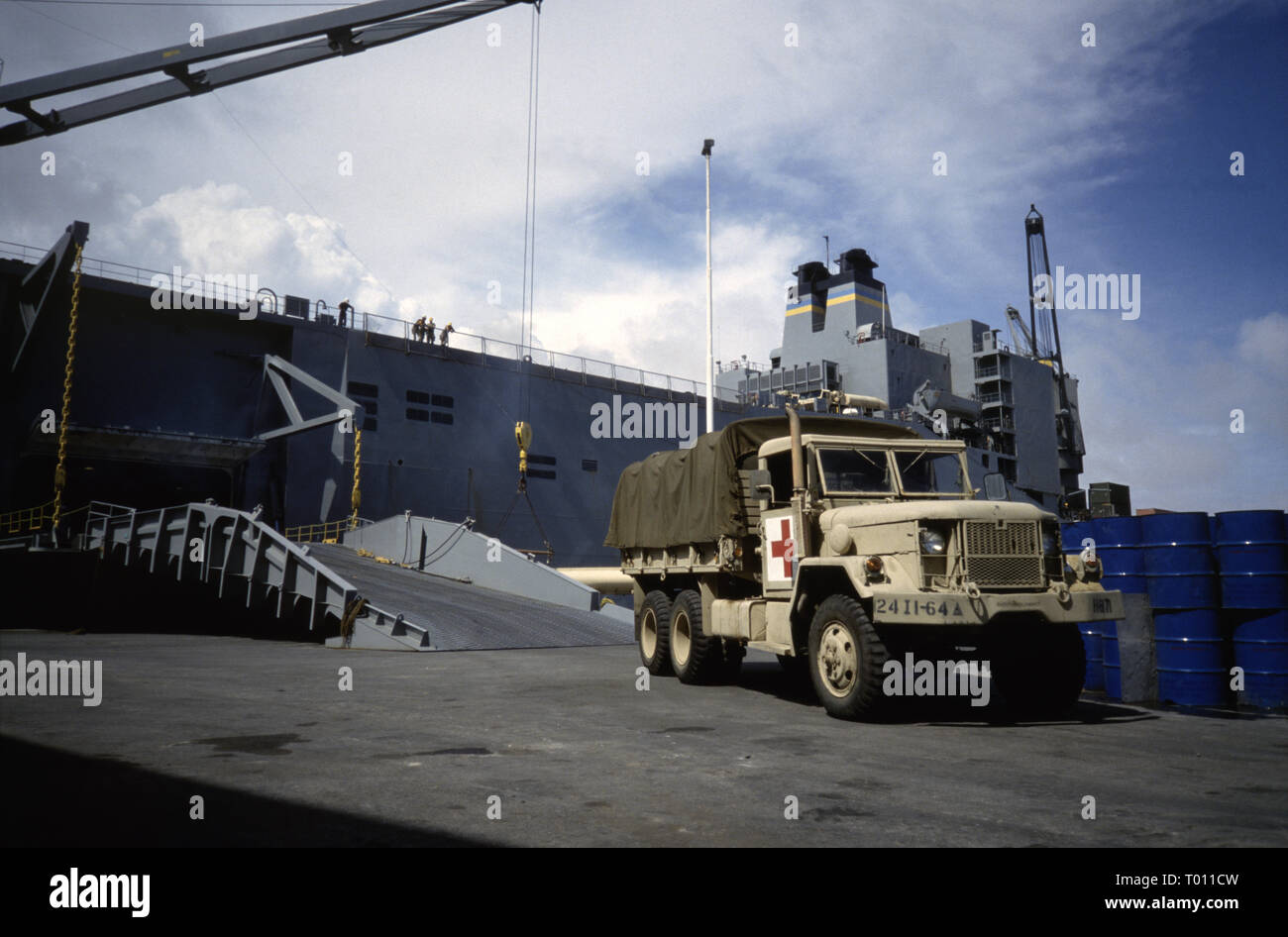 29th October 1993 An M35 Light Utility Truck comes off the ramp of the United States Marine Administration vehicle cargo ship USNS Denebola, berthed in Mogadishu's new port in Somalia. Stock Photo