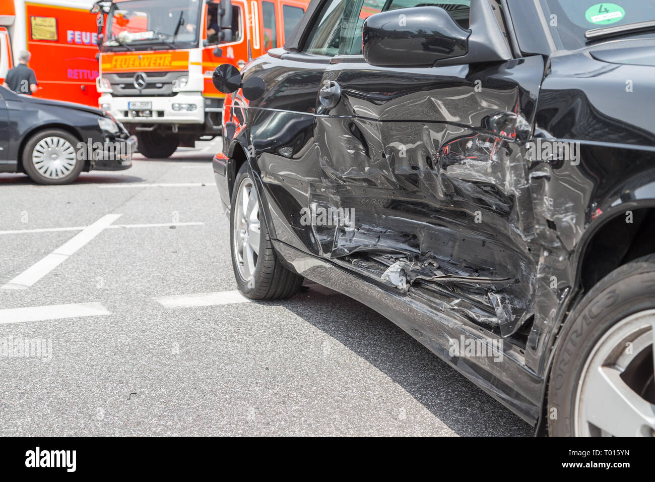 road accident with black car Stock Photo