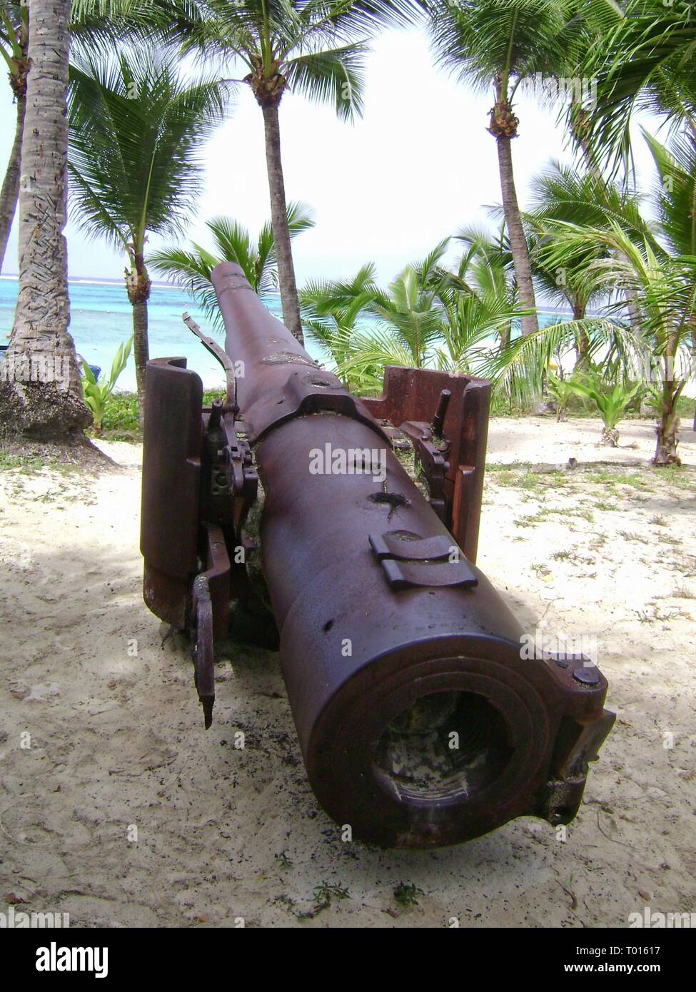 Relics of a World War 11 Japanese cannon preserved at Managaha Island, Saipan, Northern Mariana Islands Stock Photo