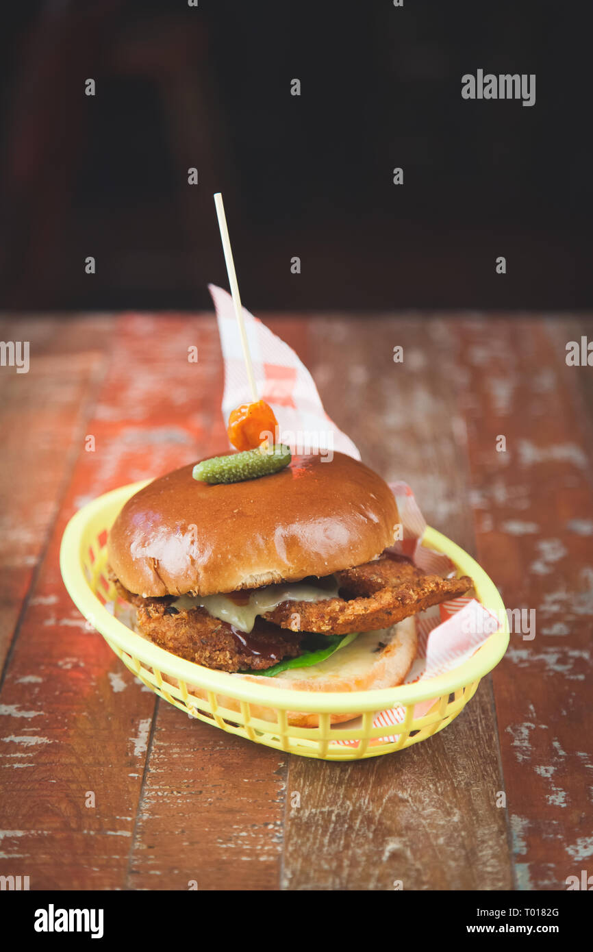 Chicken Burger in a basket in a pub bar Stock Photo Alamy
