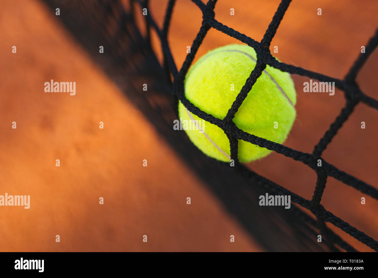 Tennis ball hitting the net Stock Photo Alamy