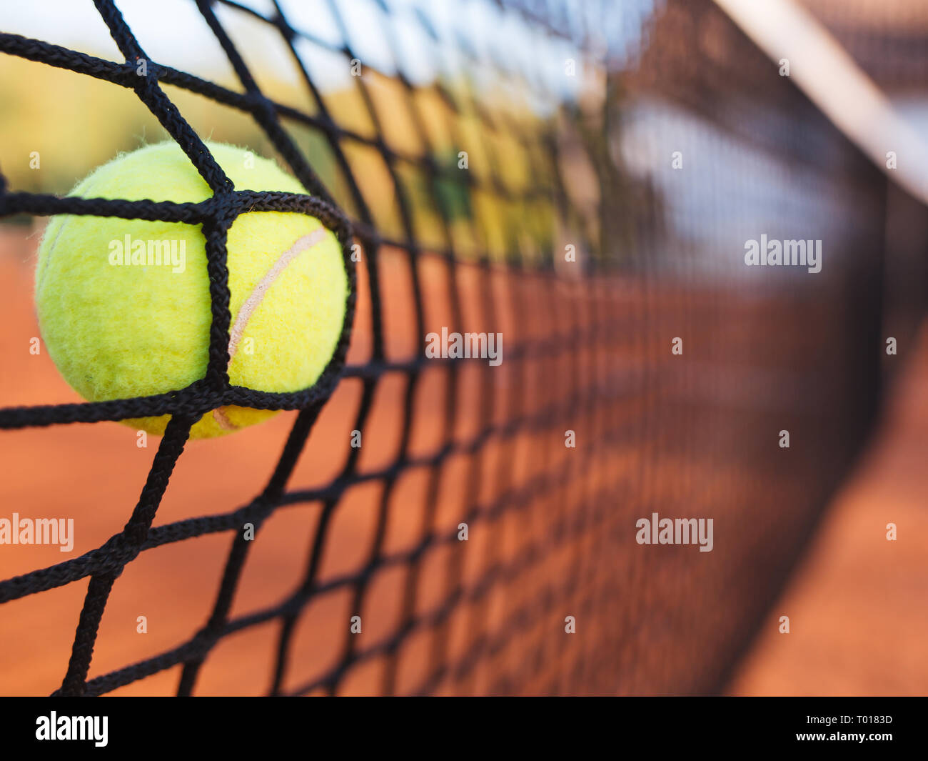 Tennis ball hitting the net Stock Photo Alamy