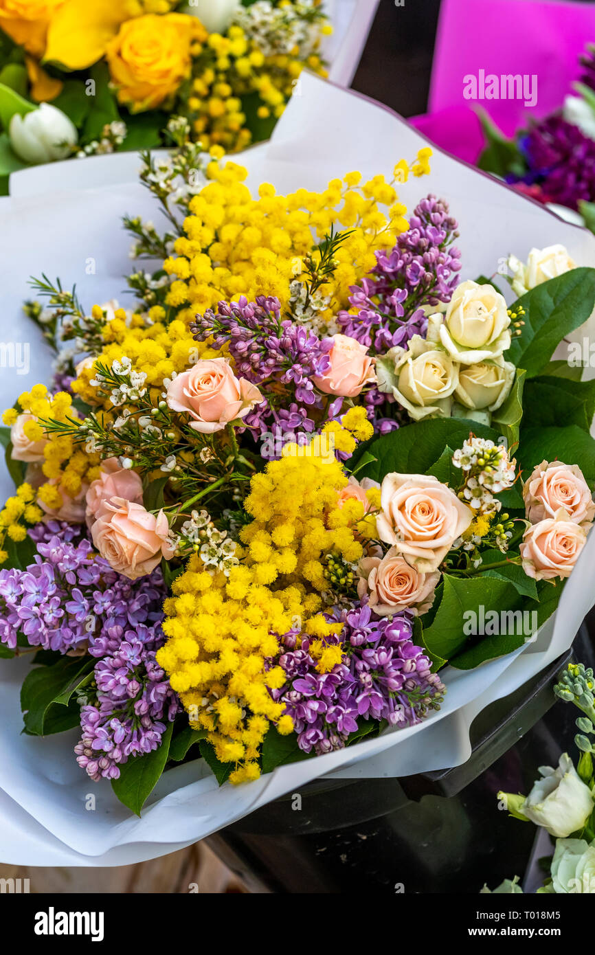 Street florist on Worlds Women's Day. High Street Kensington