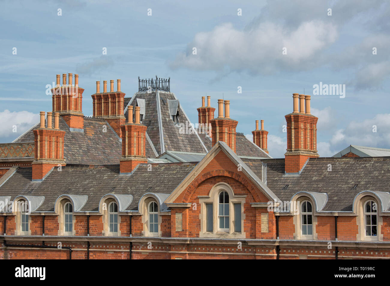 Chimneys and Chimney Pots - Tall Brick Chimney Stacks on Victorian Railway Station in Nottingham Stock Photo