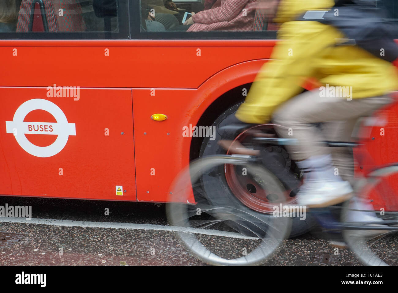Red bus in motion hi-res stock photography and images - Alamy