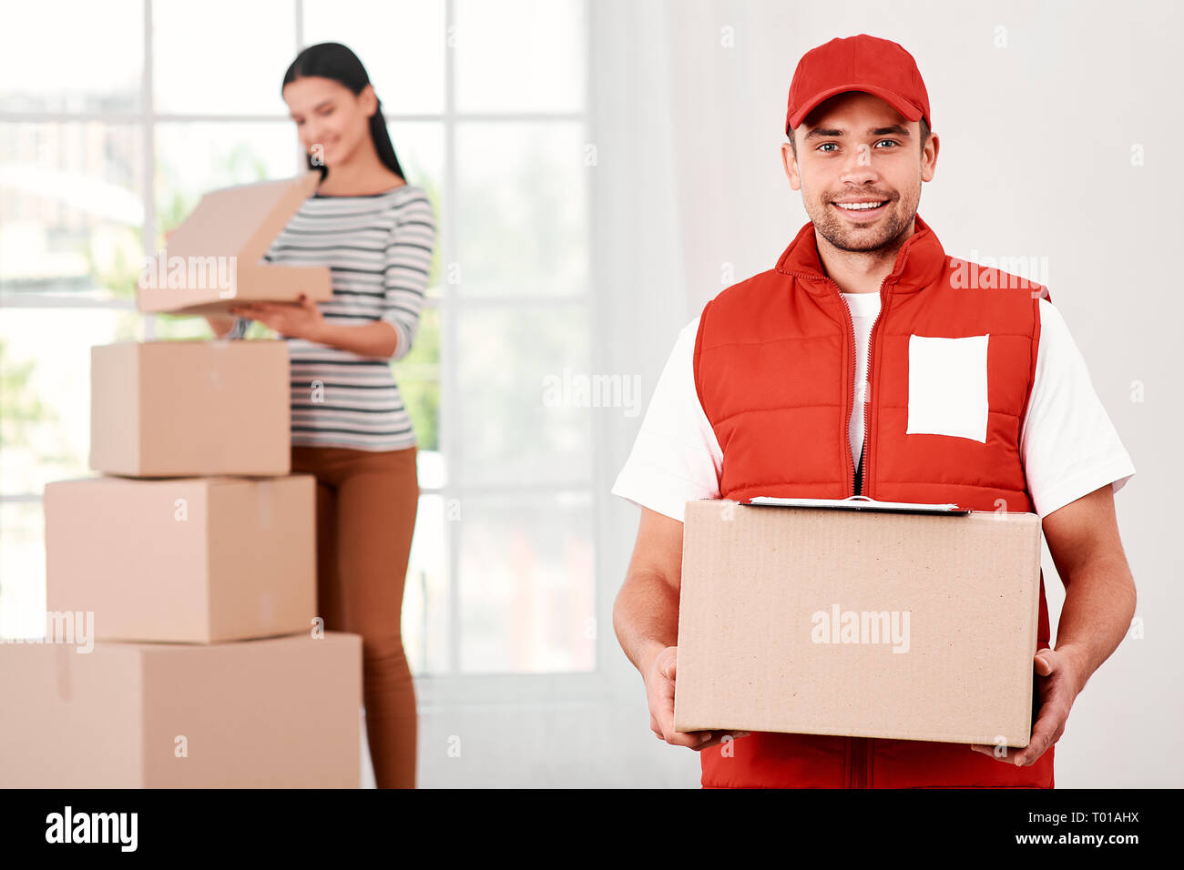 Female postal worker hires stock photography and images Alamy