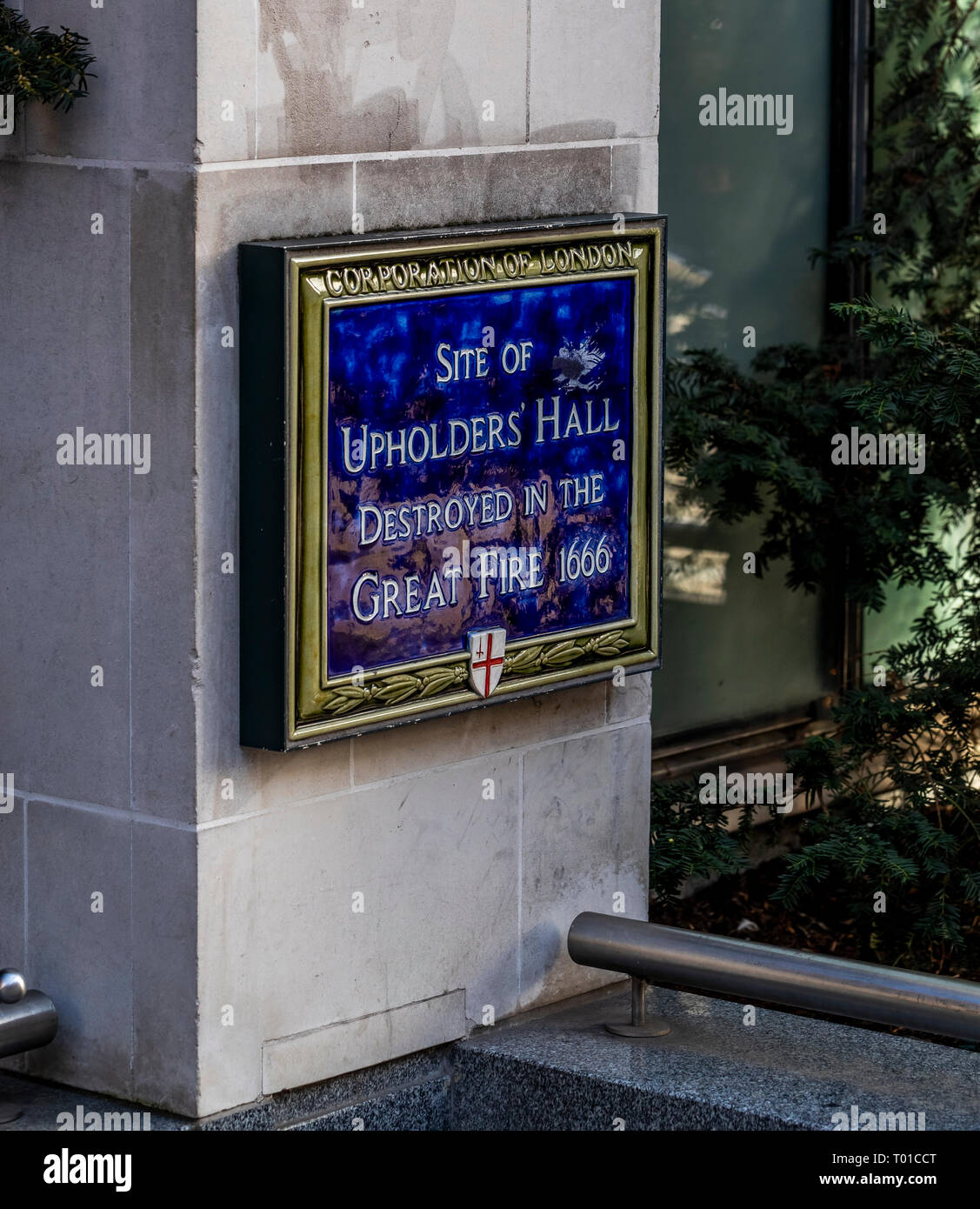 Site of the Upholders Hall destroyed in the Fire of London. Dotted over the capital, these signs recall historical locations before the Great Fire Stock Photo