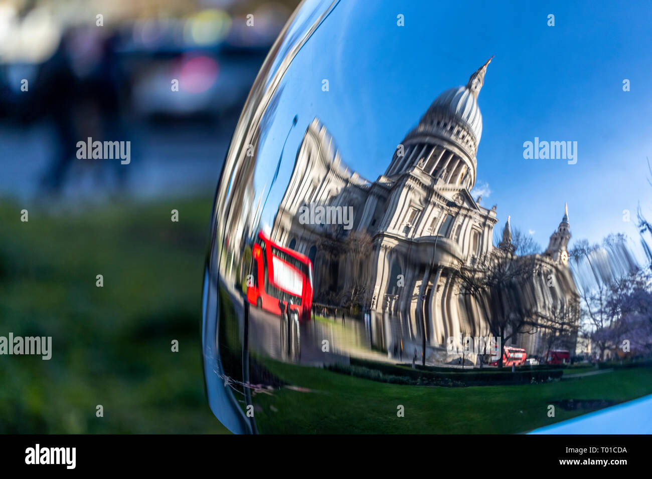 St Paul's Cathedral reflected in a modern sculpture in Carter Lane