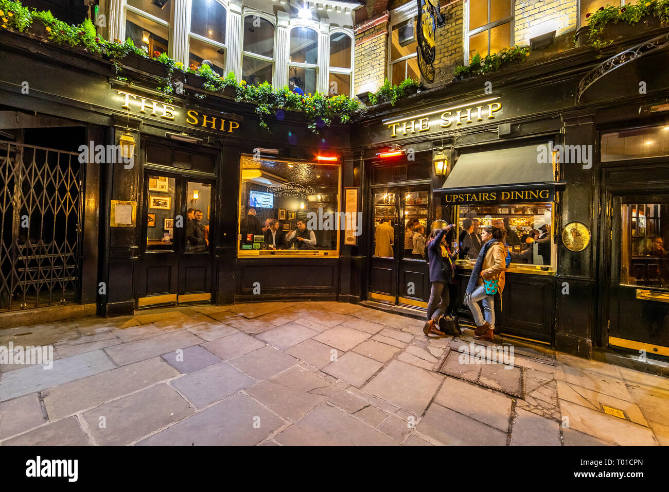 Historic London public house, The Ship, Talbot Court in the City of London. Part of the Nicholson's pub chain. Stock Photo