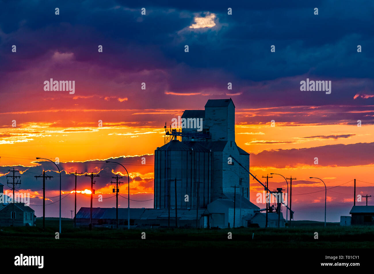 Grain elevators at sunset, Warner, Alberta, Canada Stock Photo Alamy