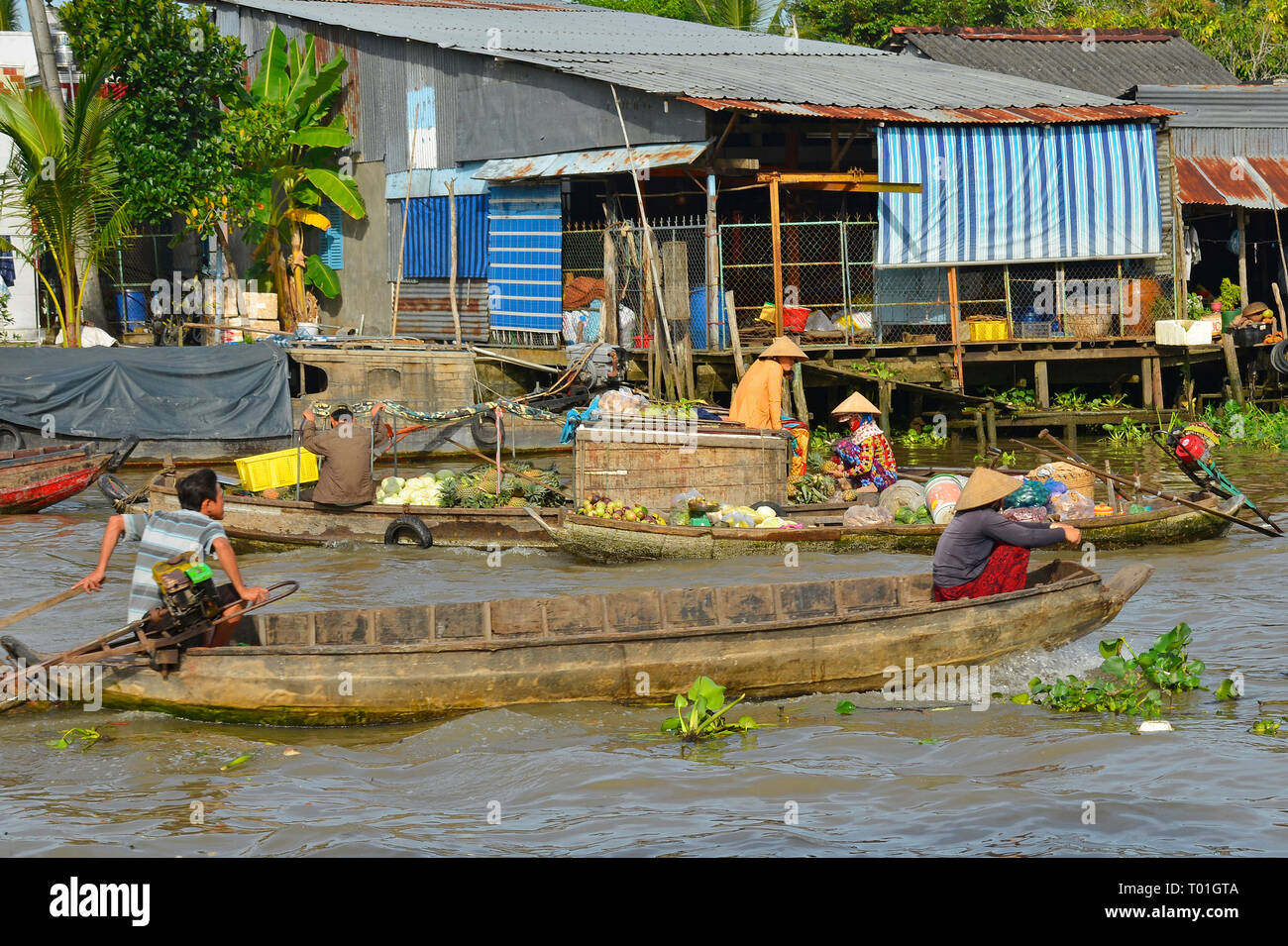 Phong Dien, Vietnam - December 31st 2017. Local vendors on the river at the Phong Dien Floating Market near Can Tho in the Mekong Delta Stock Photo