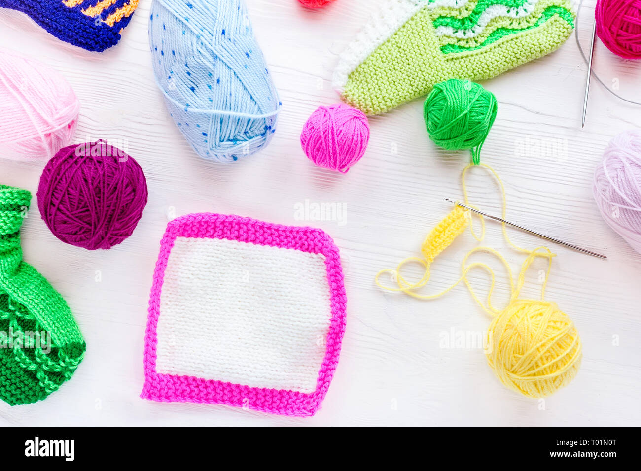 knitting ball of yarn and knitting needles on a white background Stock ...