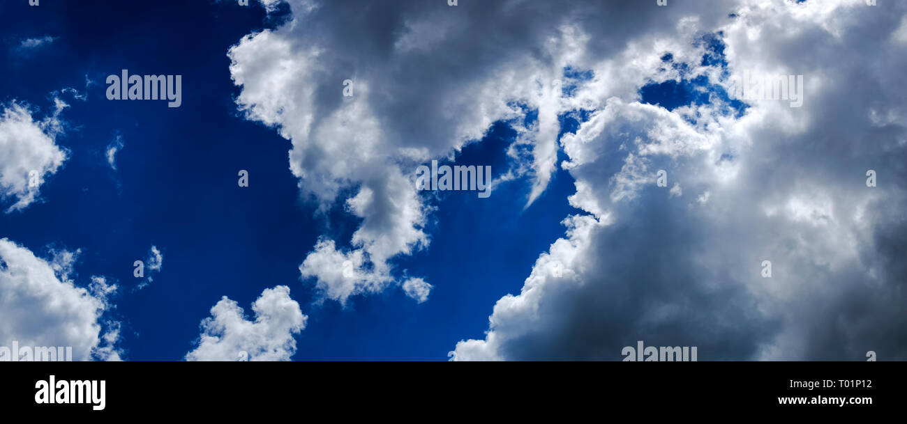 Curly clouds hi-res stock photography and images - Alamy