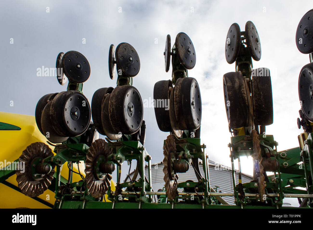 Detail of a 20 row seed planting implement at a farm equipment auction
