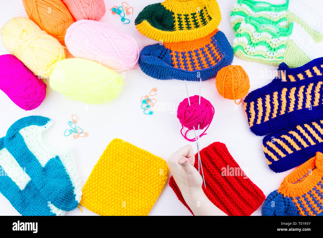 girl knits sock knitting needles on white background Stock Photo - Alamy