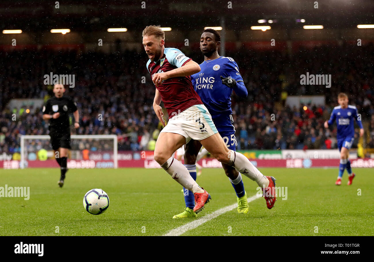 Burnley's Charlie Taylor goes down in the penalty area after Leicester City's Wilfred Ndidi during the Premier League match at Turf Moor, Burnley. Stock Photo
