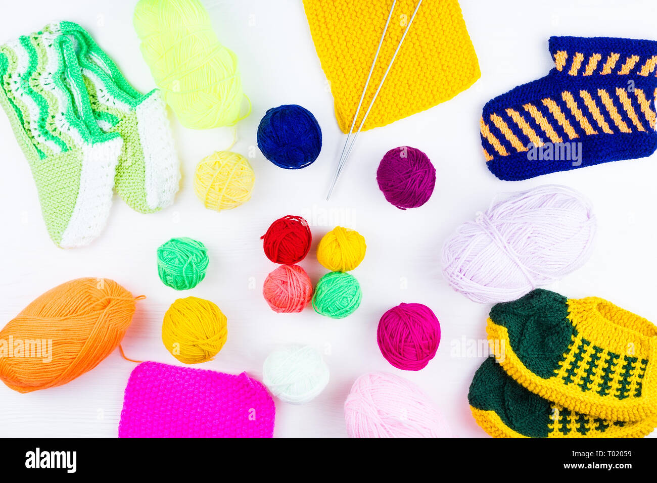 knitting ball of yarn and knitting needles on a white background Stock ...