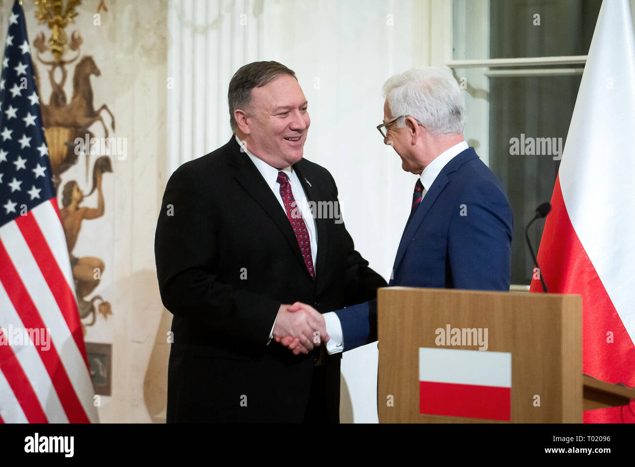 Polish Foreign Minister Jacek Czaputowicz (R) and US Secretary of State Mike Pompeo (L) shake hands during a press conference after their meeting at the Lazienki Park in Warsaw, Poland on 12 February 2019 Stock Photo