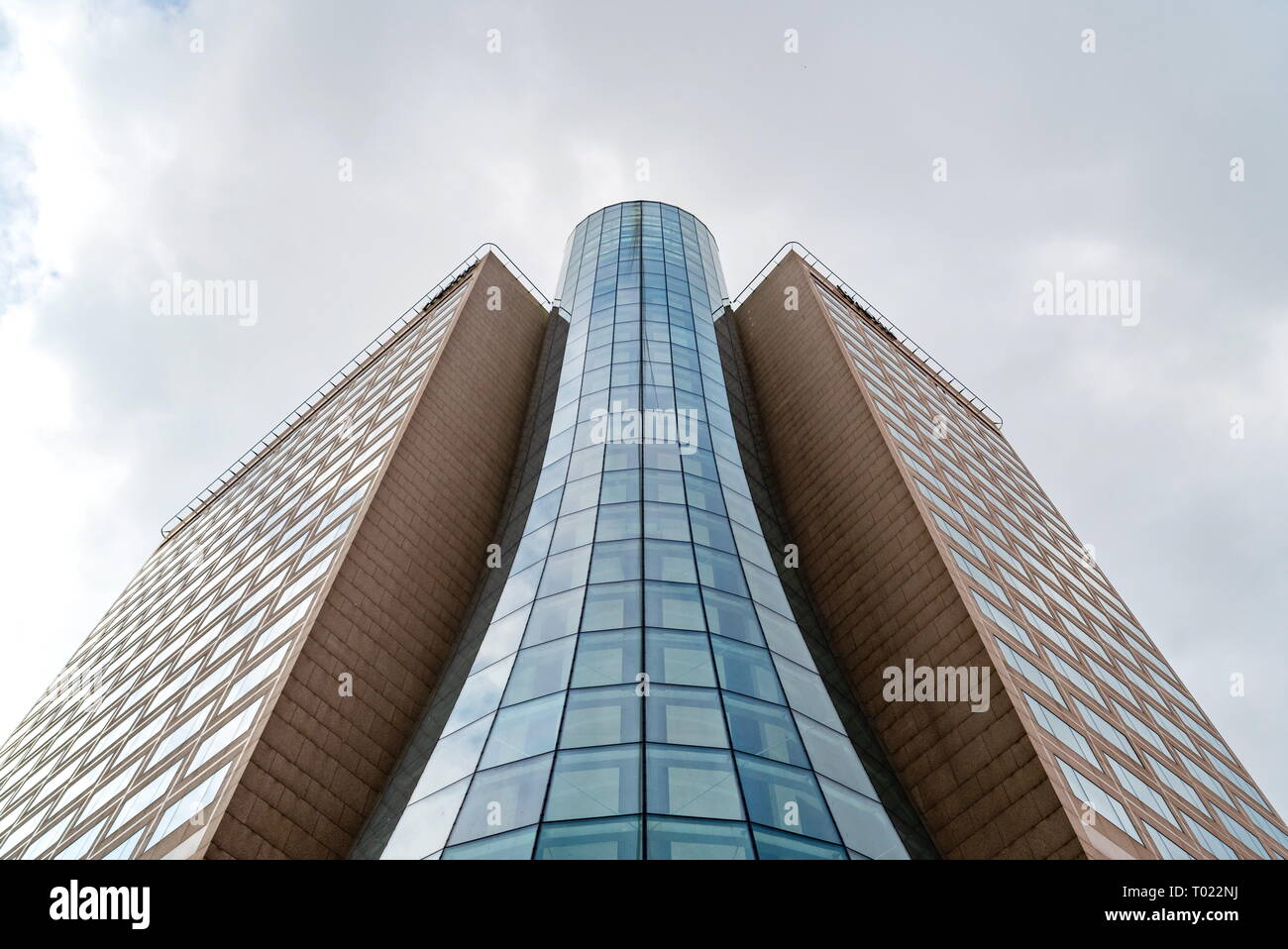 Business center. Glass building. Against the sky. Stock Photo