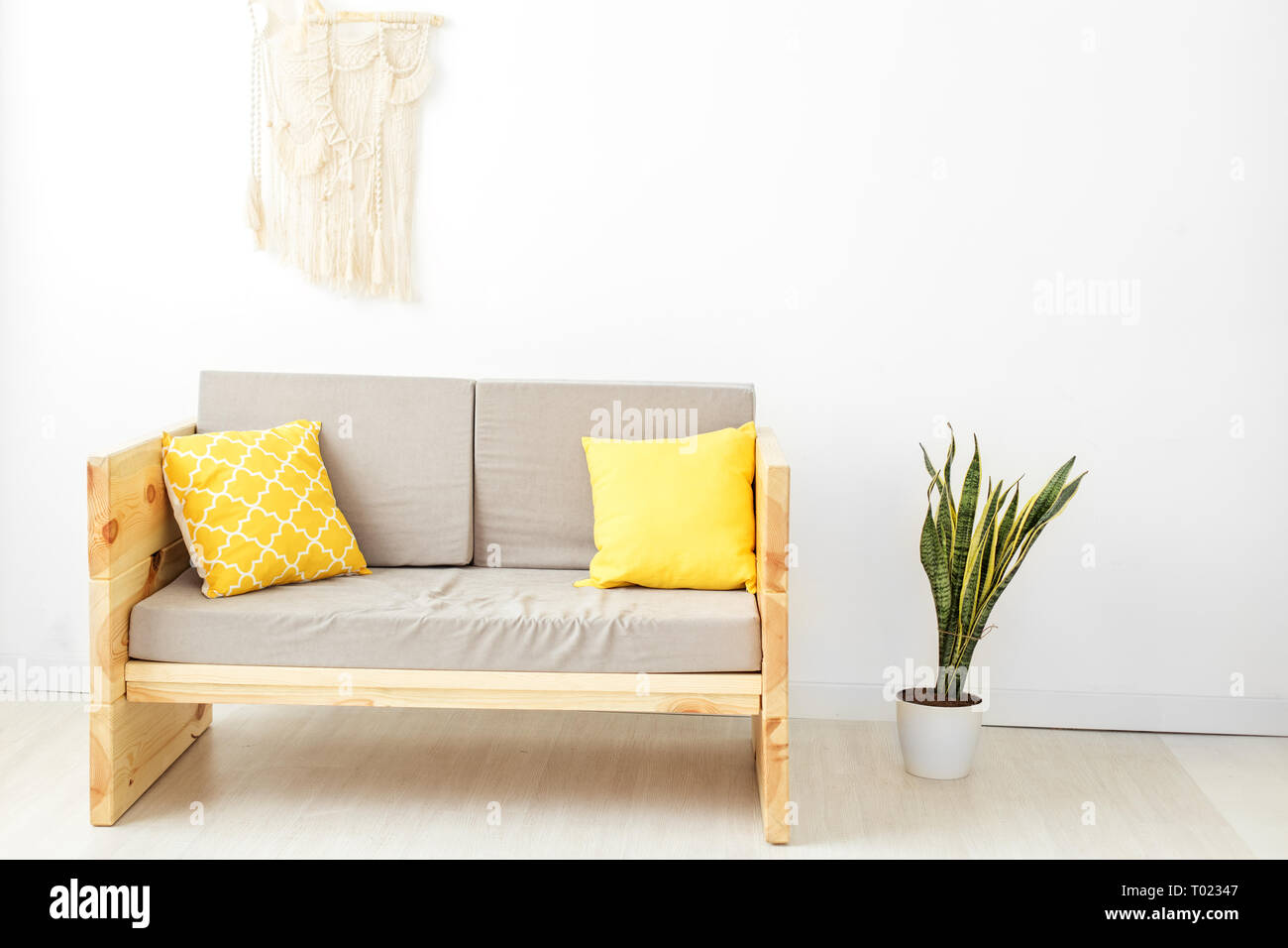 he interior of the room with a sofa. Concept design, renovation, housing. Stock Photo
