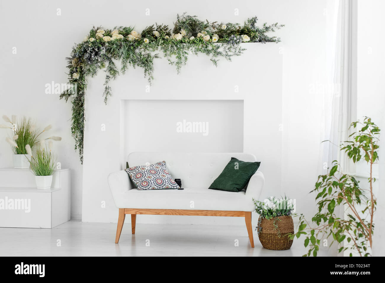 Beautiful interior room with a sofa. Minimalism. Concept design, renovation, housing Stock Photo