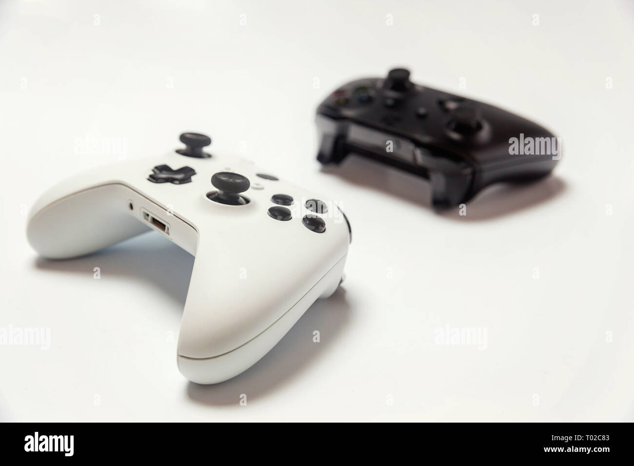 White and black two joystick gamepad, game console isolated on white ...