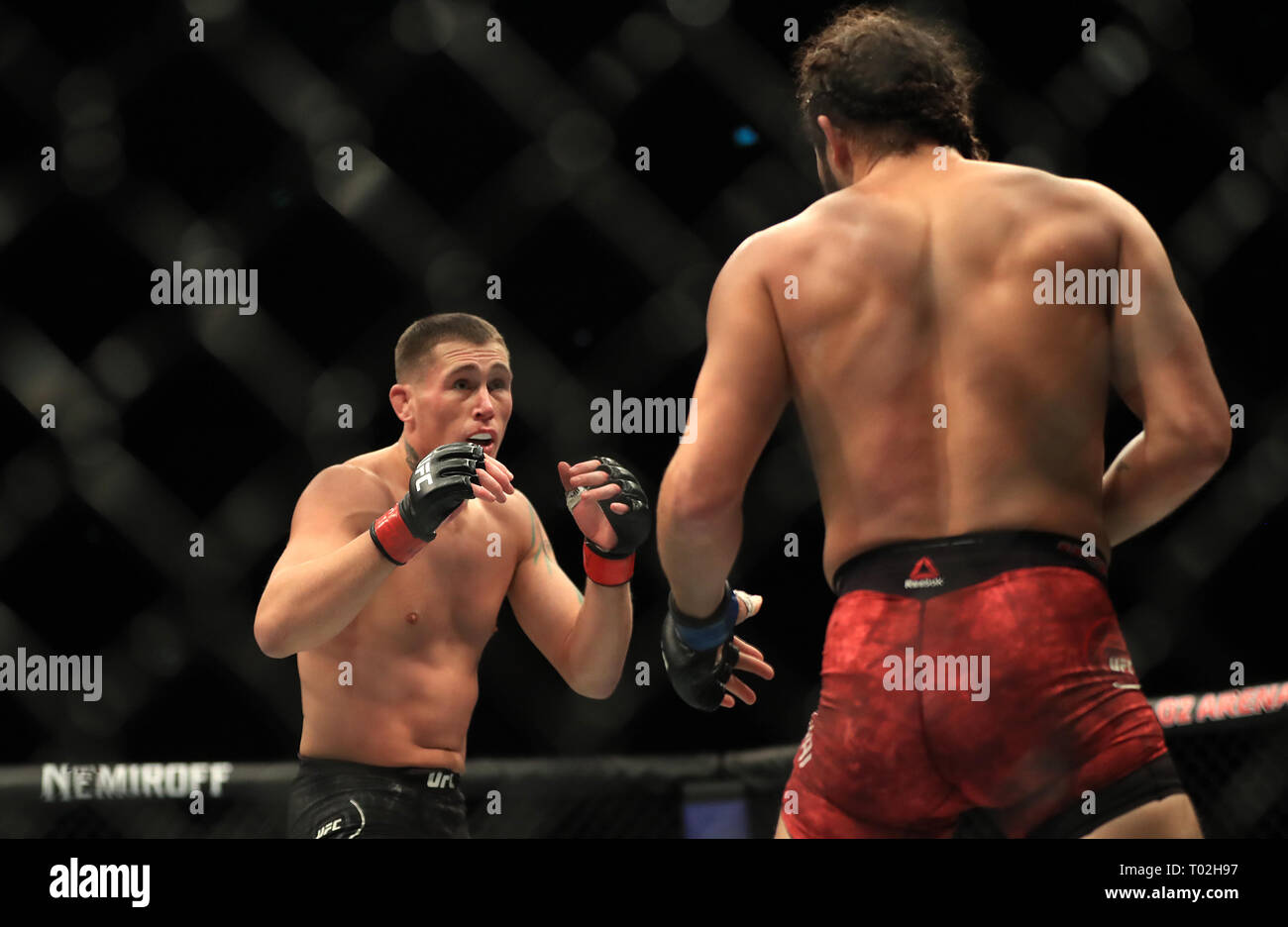 Darren Till (left) and Jorge Masvidal in action during their Welterweight  bout during UFC Fight Night 147 at The O2 Arena, London Stock Photo - Alamy