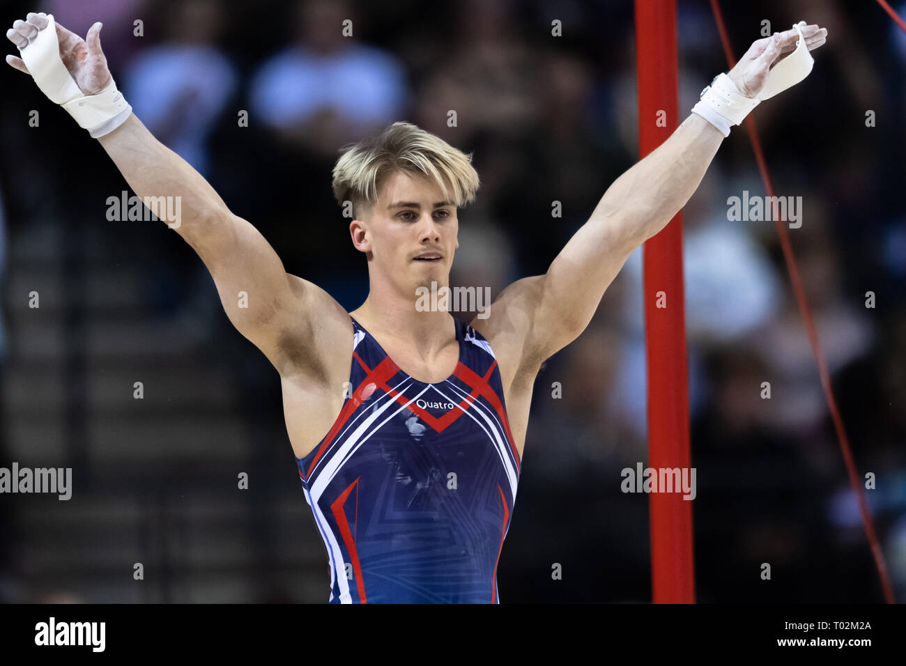 Liverpool, UK. 16th March 2019. Jay Thompson (South Essex Gym) preforms High Bar in Man's Senior All-Around during the 2019 Gymnastics British Championships at M&S Bank Arena on Saturday, 16 March 2019. LIVERPOOL ENGLAND. (Editorial use only, license required for commercial use. No use in betting, games or a single club/league/player publications.) Credit: Taka G Wu/Alamy News Credit: Taka Wu/Alamy Live News Stock Photo
