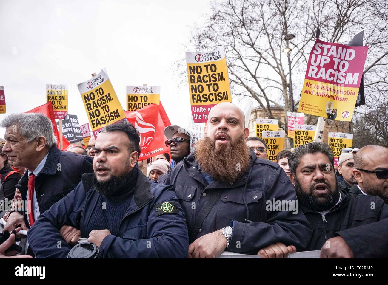 London, UK. 16th March 2019. Protesters are seen shouting slogans while holding placards during an anti racist demonstration. Thousands of anti-racists groups took to the streets marking the World against Racism global day of action. Credit: SOPA Images Limited/Alamy Live News Stock Photo