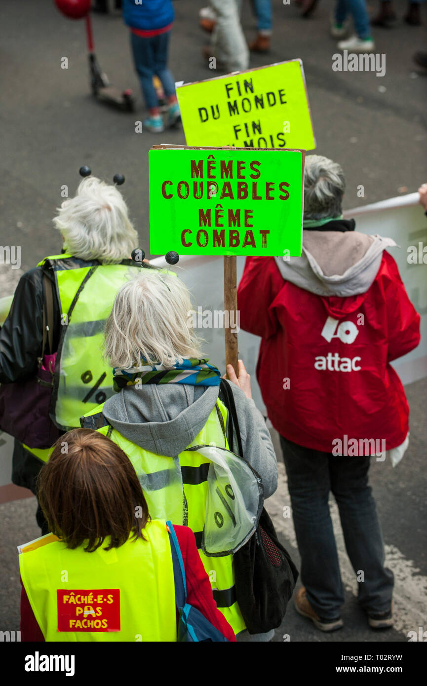 Paris, France. 16th March 2019. Protesters seen holding several placards during the March of The Century strike in Paris. Thousands of people demonstrated in the streets of Paris to denounce the inaction of the government about the climate change during a march called 'March of The Century' (La Marche du Siecle). Credit: SOPA Images Limited/Alamy Live News Stock Photo