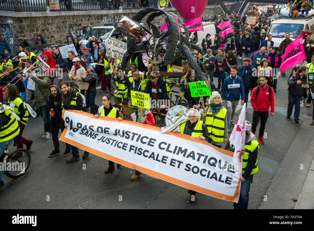 Paris, France. 16th March 2019. Protesters seen holding a large banner during the March of The Century strike in Paris. Thousands of people demonstrated in the streets of Paris to denounce the inaction of the government about the climate change during a march called 'March of The Century' (La Marche du Siecle). Credit: SOPA Images Limited/Alamy Live News Stock Photo