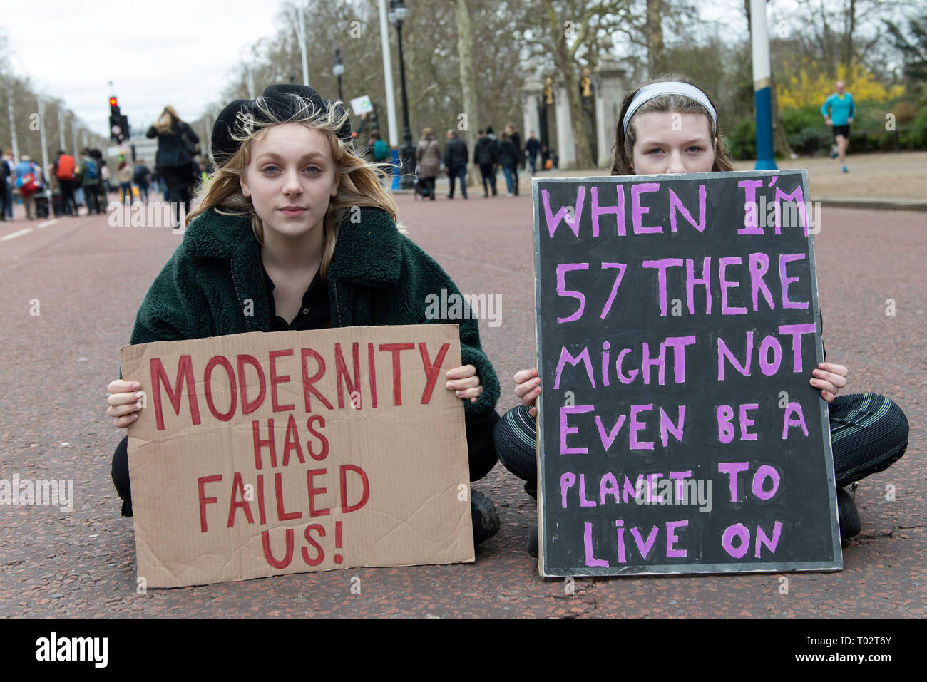 Youths are seen with placards at Parliament Square during the protest. Hundreds of young people gathered at Parliament Square, joining the Global Climate Strike and demanding from the government and politicians direct actions to tackle the climate change. Students in more than 100 countries went to the streets to participate in a climate global strike. Stock Photo