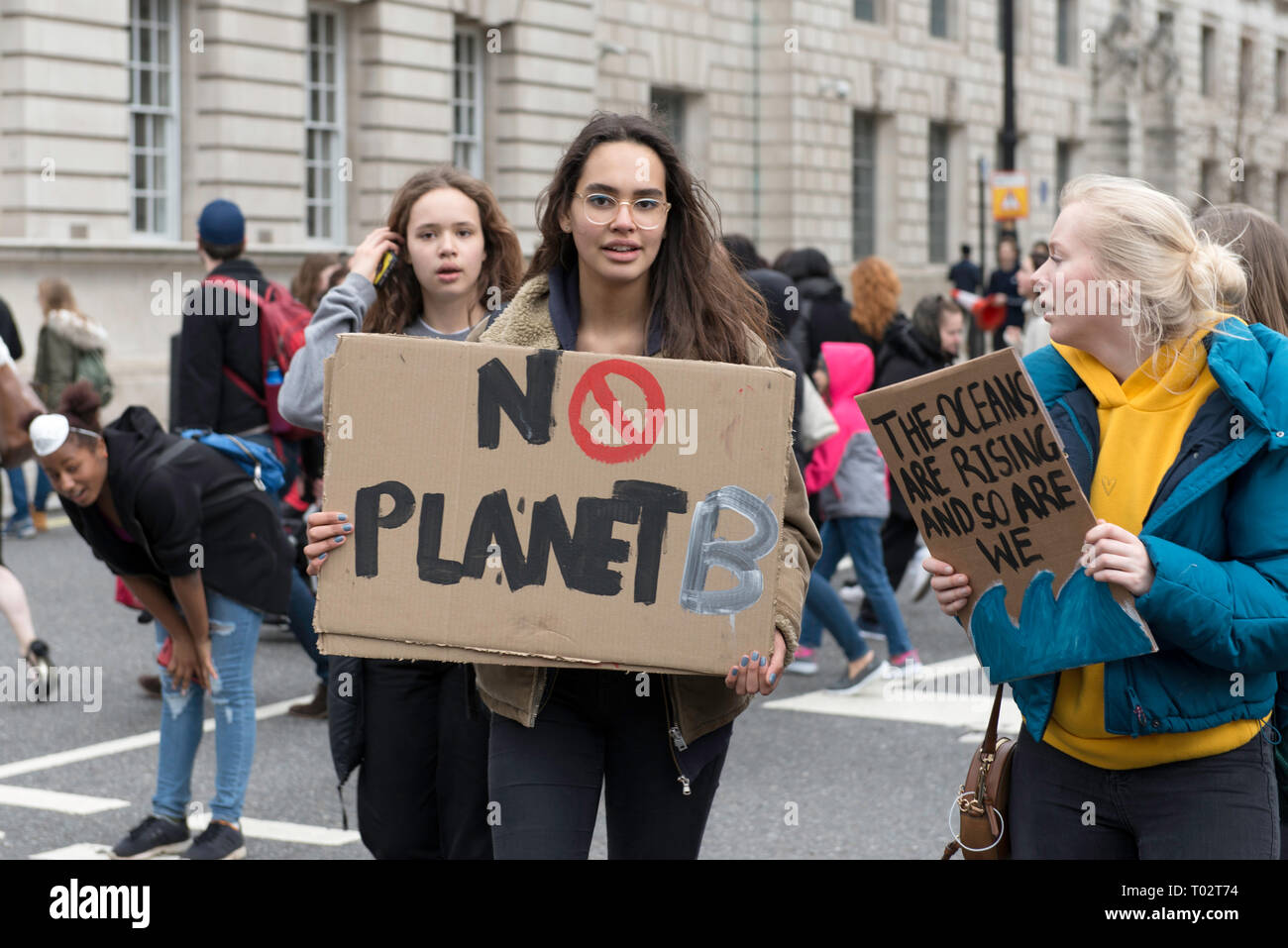 Youths are seen with placards during the protest. Hundreds of young people gathered at Parliament Square, joining the Global Climate Strike and demanding from the government and politicians direct actions to tackle the climate change. Students in more than 100 countries went to the streets to participate in a climate global strike. Stock Photo