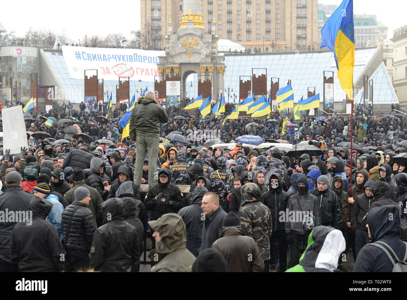 Kiev, Ukraine. 16th March 2019. Right wing nationalists protest Ukrainian president Poroshenko in Kiev, Ukraine.  Upwards of 2-3,000 nationalists marched from Independence Square to the presidential administration building and hurled stuffed pigs at police and national guard.  National Corps party member and Member of Parliament Andrei Biletsky spoke to his supporters of mostly young males dressed in uniforms and various neo Nazi symbols. Credit: Mario Montoya/Alamy Live News Stock Photo