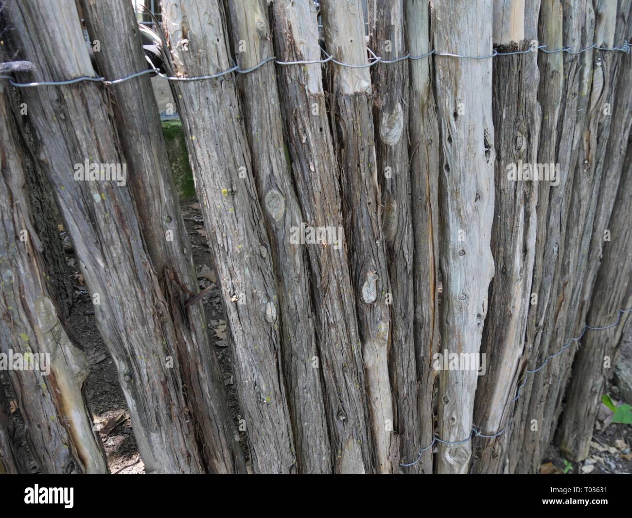Round wooden fence posts hi-res stock photography and images - Alamy