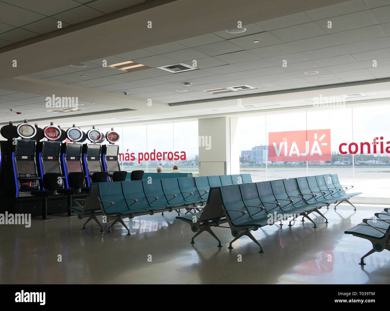 SAN JUAN, PUERTO RICO—MARCH 2017: Empty seats at one of the pre-departure areas of the Luis Muñoz Marín International Airport in Puerto Rico. Stock Photo