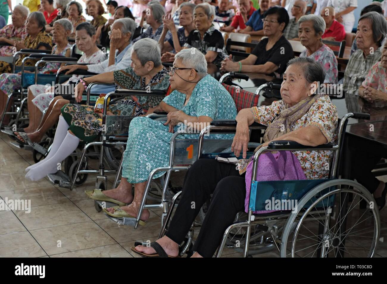 BOGOR, WEST JAVA, INDONESIA - FEBRUARY 2019 : A group of elderly people gather together in an elderly nursing home. Stock Photo