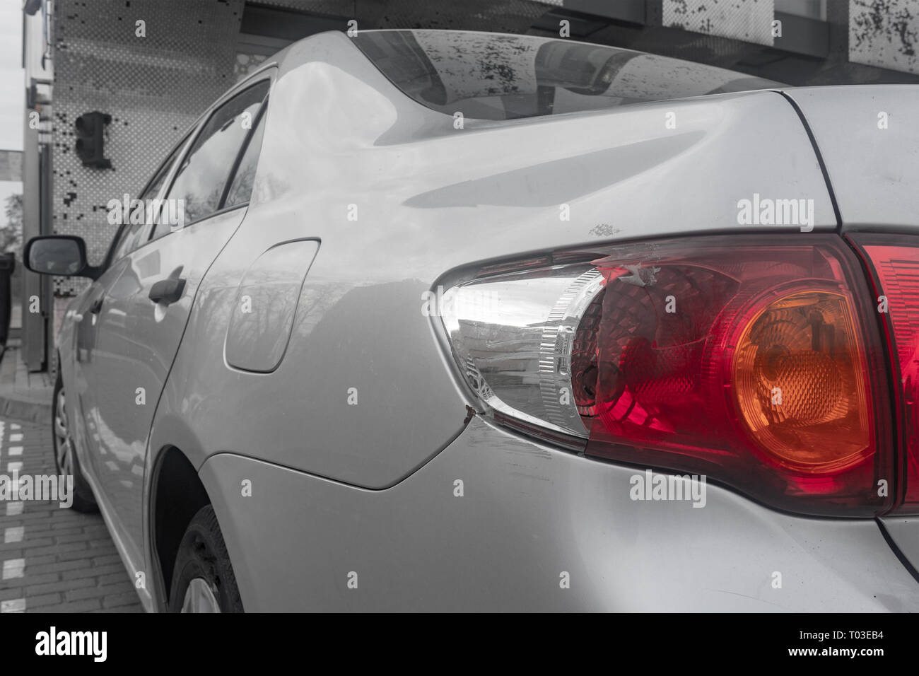 broken tail light on a gray car Stock Photo