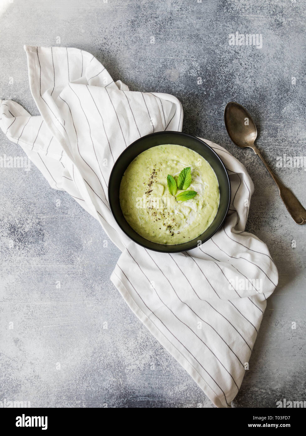 Vegetarian green cream soup of green peas with mint Stock Photo Alamy