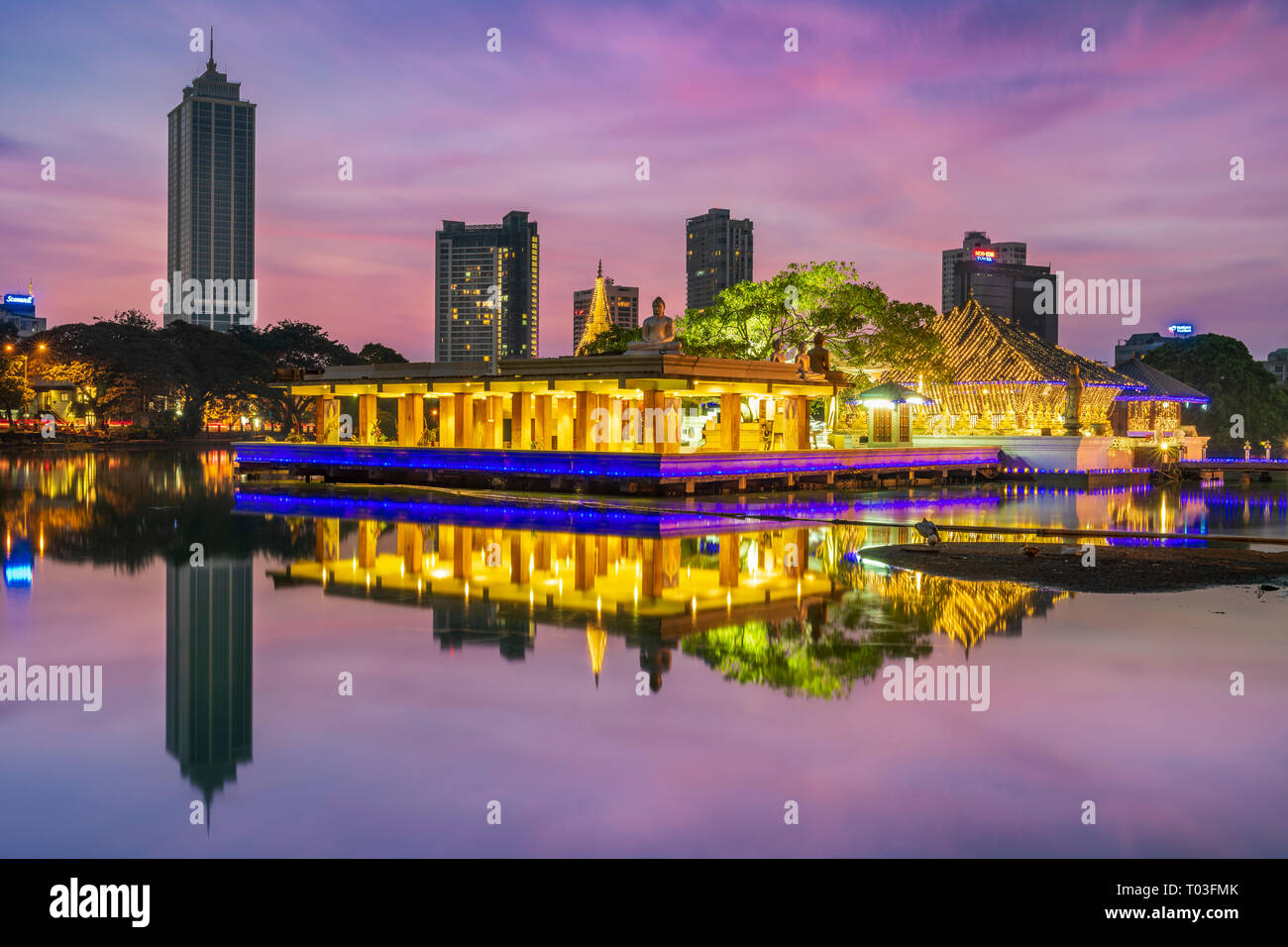 The Seema Malakaya Buddhist Temple sits on an island in Beira Lake at the heart of Colombo, Sri Lanka.  Designed by Geoffrey Bawa, the temple and medi Stock Photo