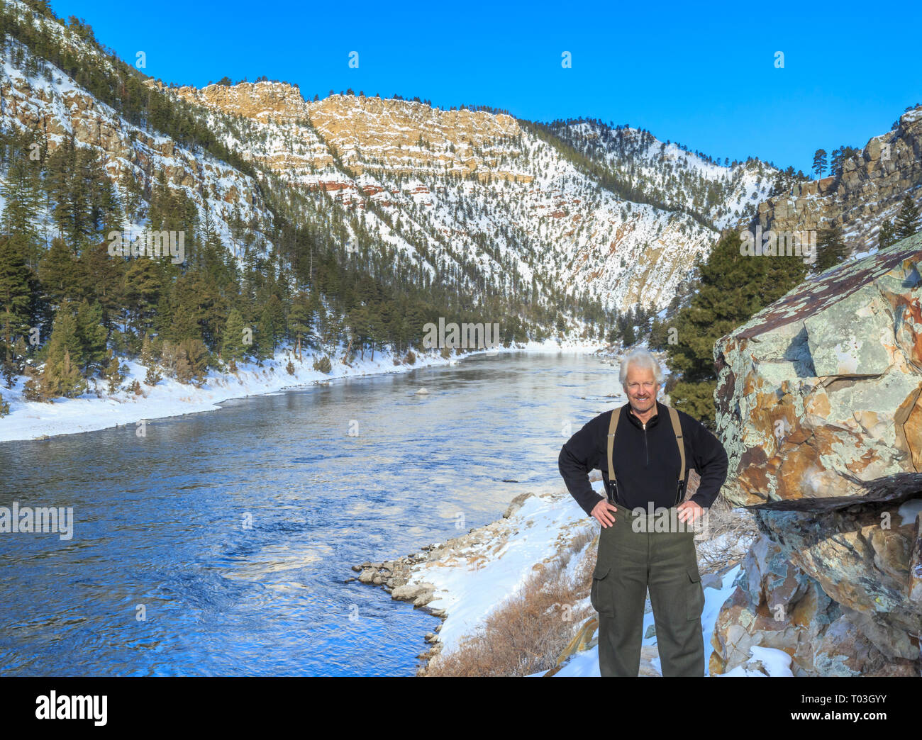 john lambing in winter along the missouri river in a canyon below hauser dam near helena, montana Stock Photo