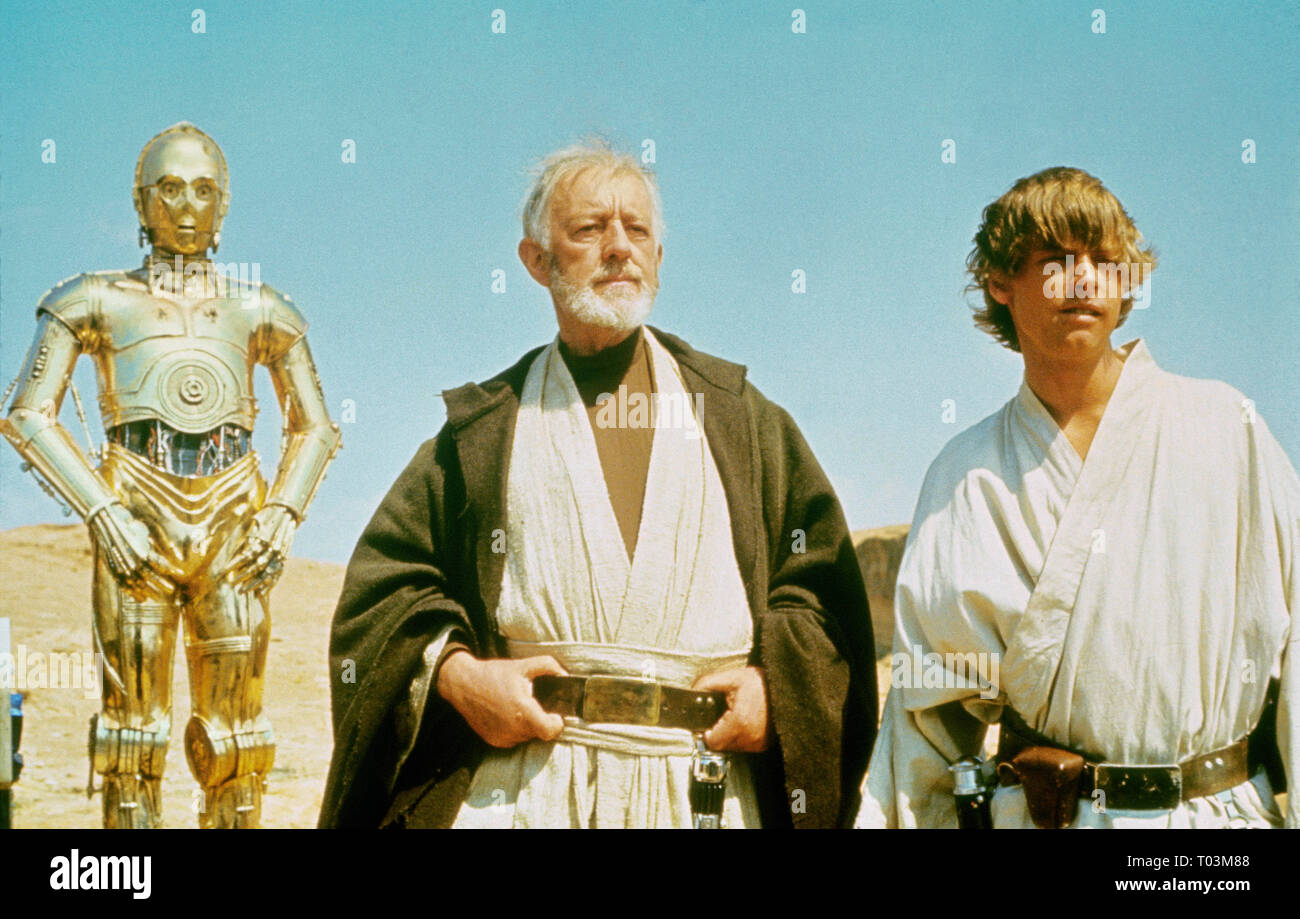 ANTHONY DANIELS, ALEC GUINNESS, MARK HAMILL, STAR WARS: EPISODE IV - A NEW HOPE, 1977 Stock Photo