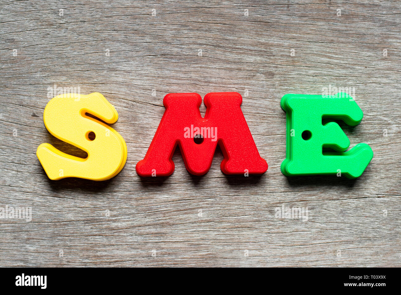 Color alphabet letter in word SME (abbreviation of Small and medium ...