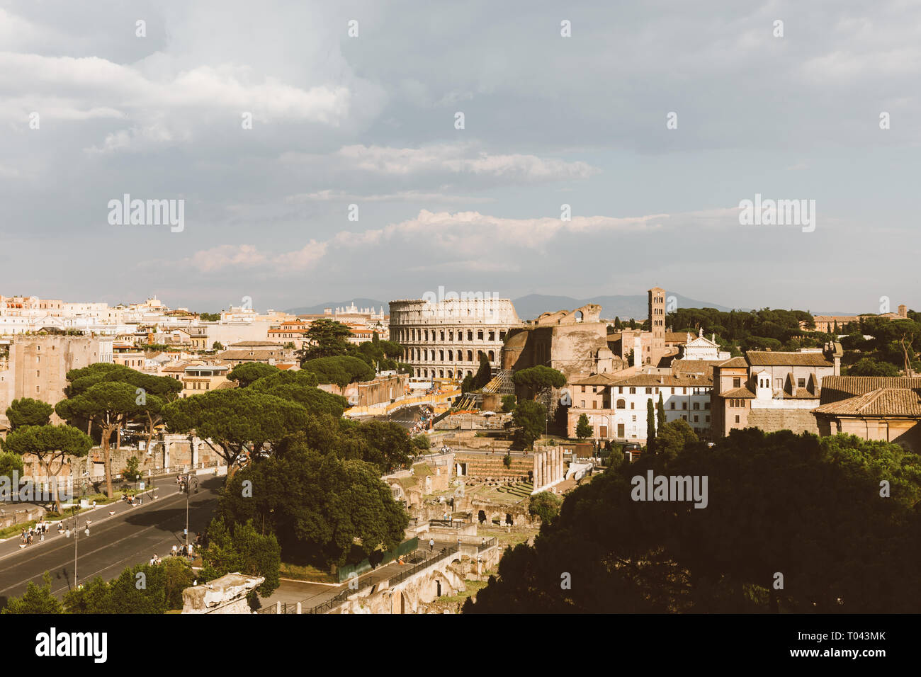 Panoramic view of city Rome with Roman forum and Colosseum from Vittorio Emanuele II Monument also known as the Vittoriano. Summer sunny day Stock Photo